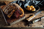 grass-fed, native breed, dry-aged sirloin roast straight out of the oven and resting before carving